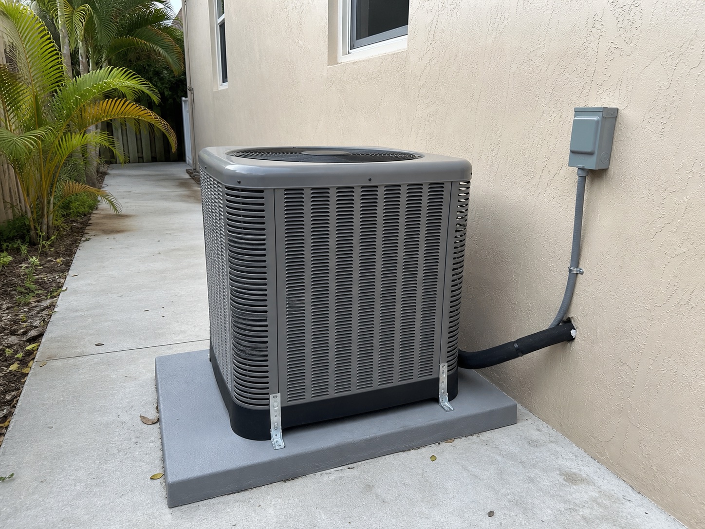 Typical South Florida central heat-pump condenser configuration