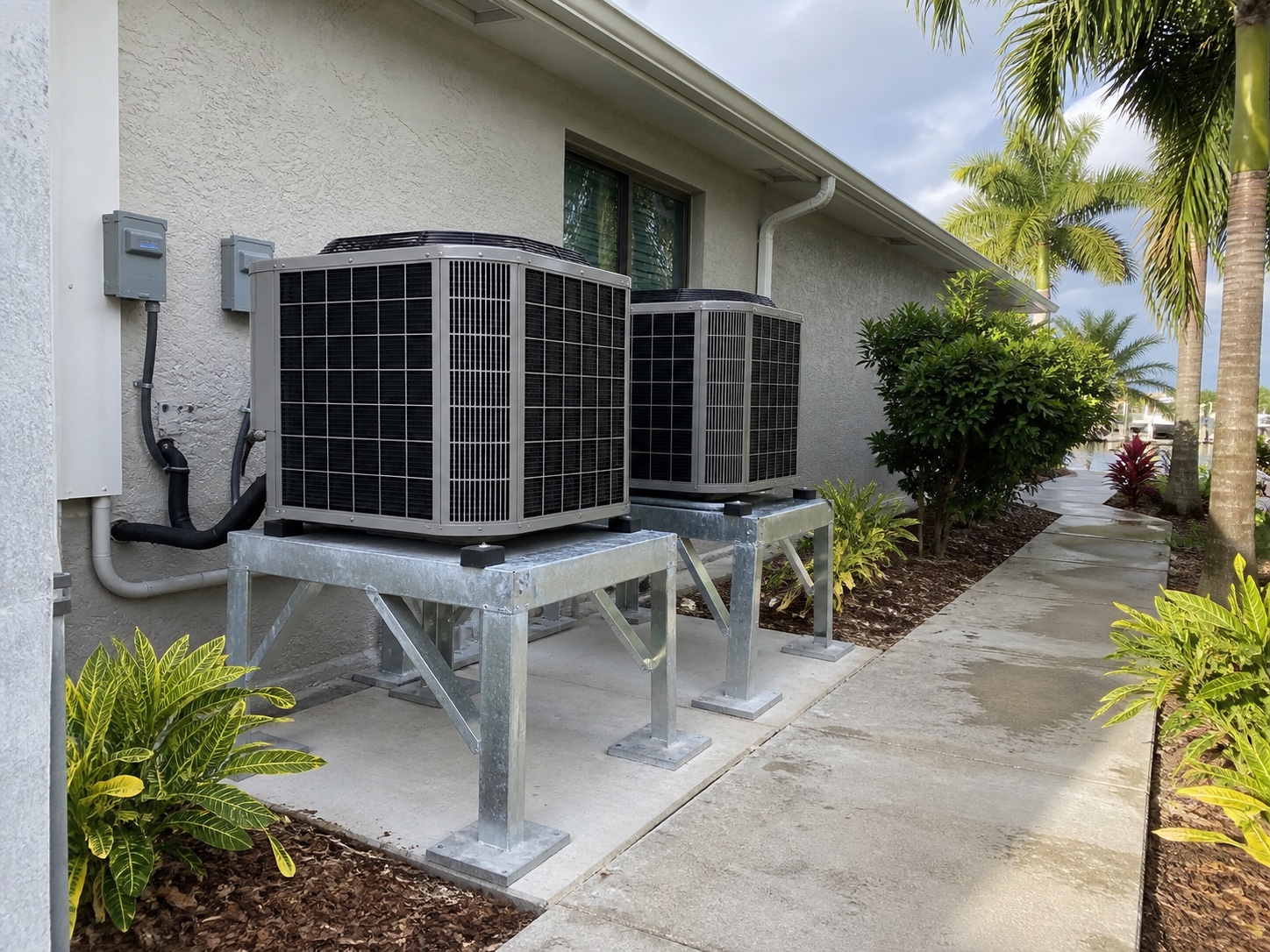 Elevated outdoor condensers at a coastal Florida property